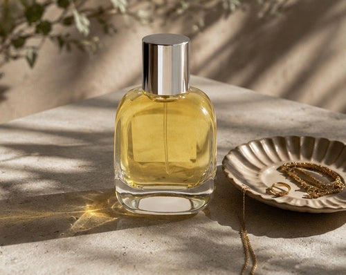 Apex Gold eau de parfum bottle on dark marble